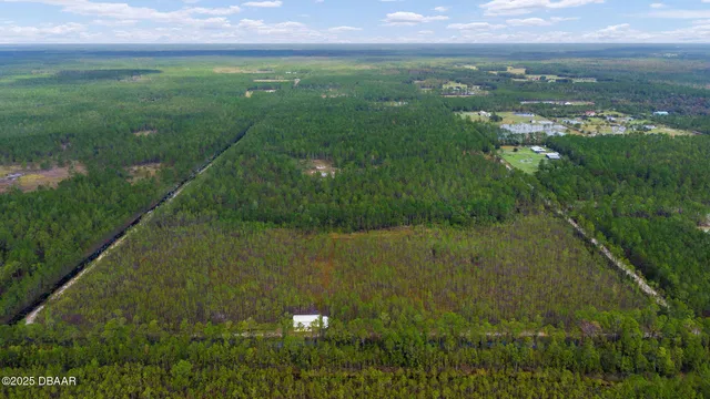 a view of swimming pool from a balcony