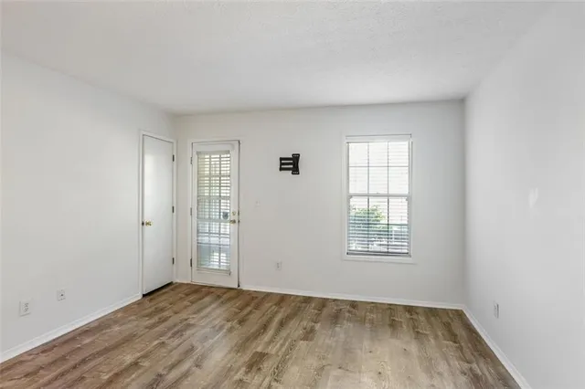 an empty room with windows