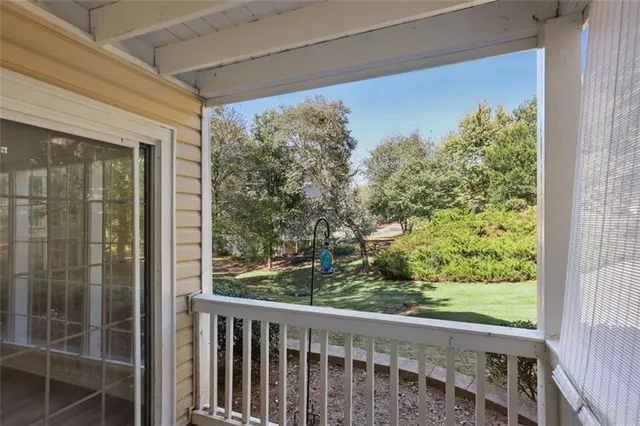 a view of a balcony with an outdoor space