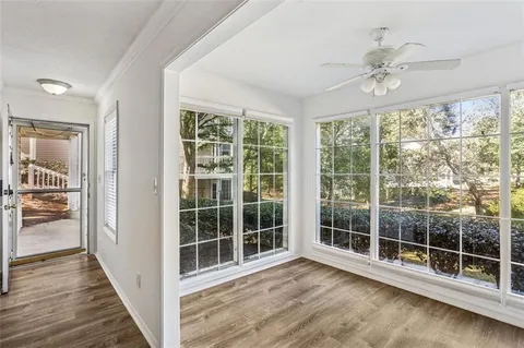 a view of a room with a large window