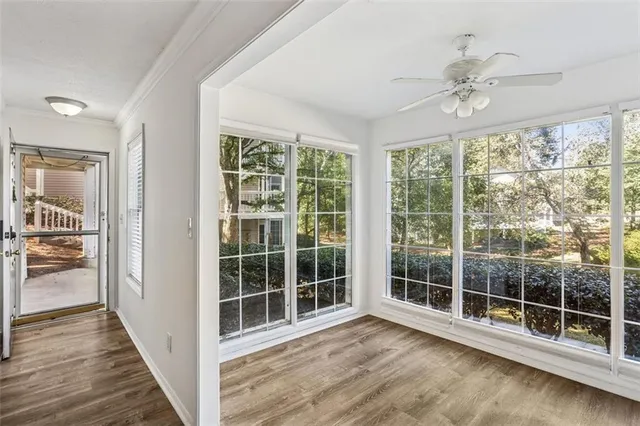 a view of a room with a large window