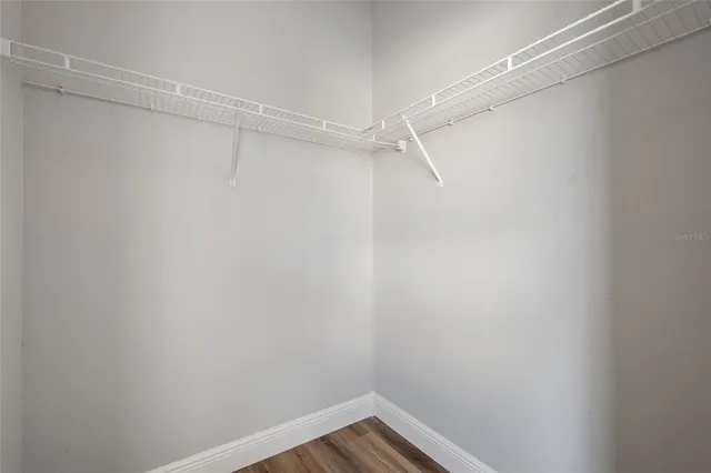 a view of a room with racks on the wall