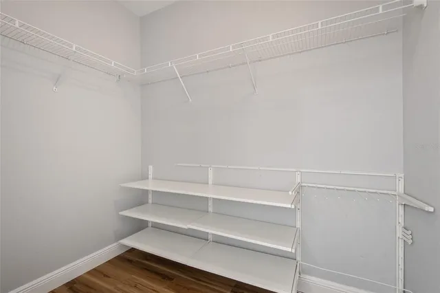 a view of an empty walk in closet