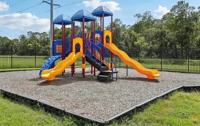 a view of outdoor space with swimming pool and sitting area