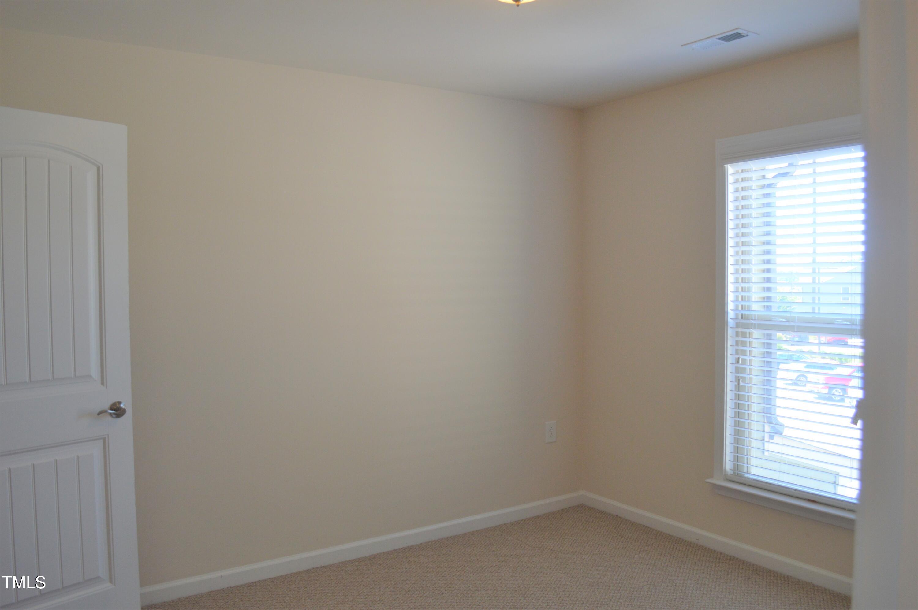 127 Brier Crossings Loop Durham, NC 27703 - Photo 11 of 14 a small space with a window
