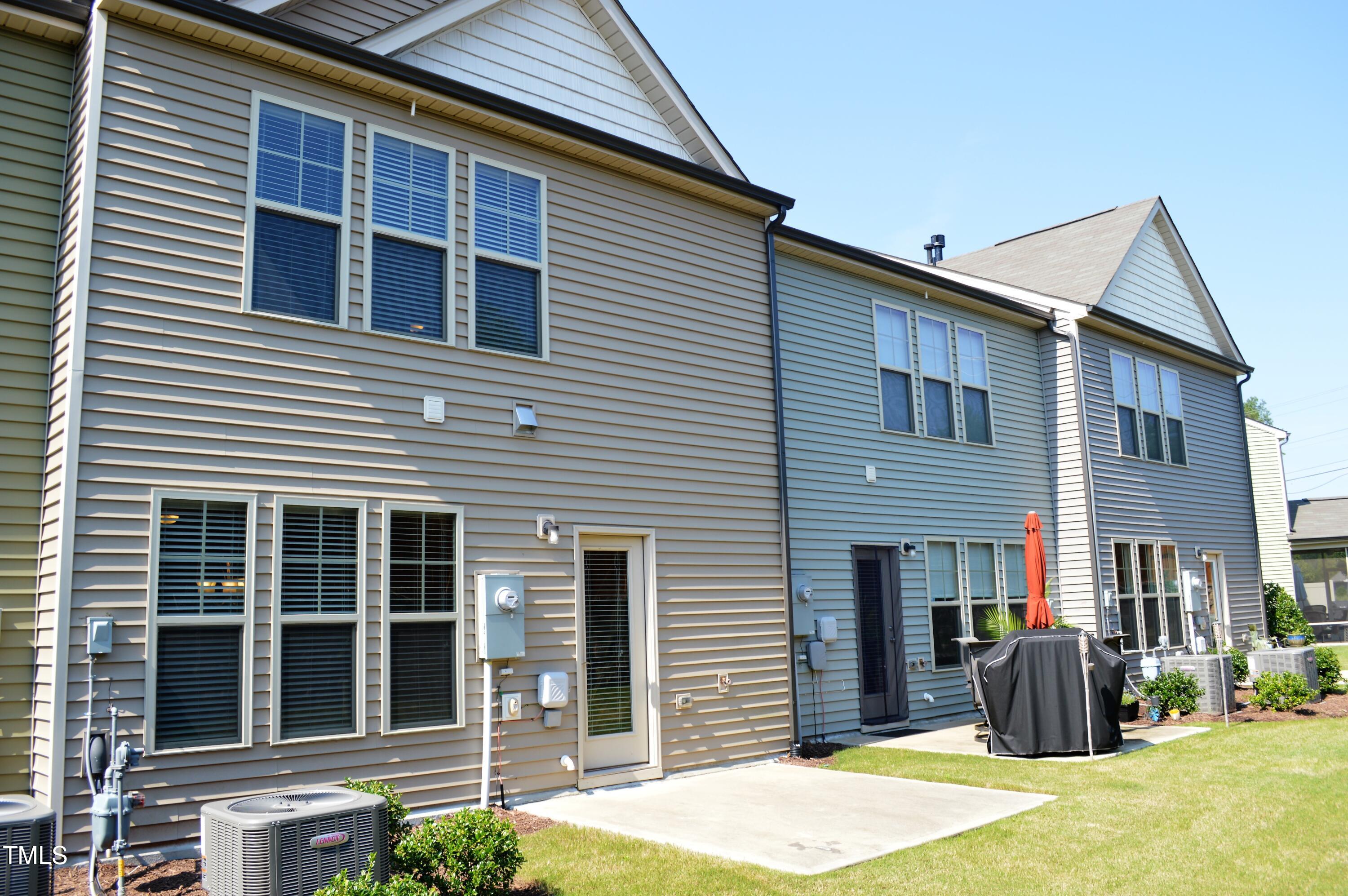 127 Brier Crossings Loop Durham, NC 27703 - Photo 13 of 14 a front view of a house with a patio