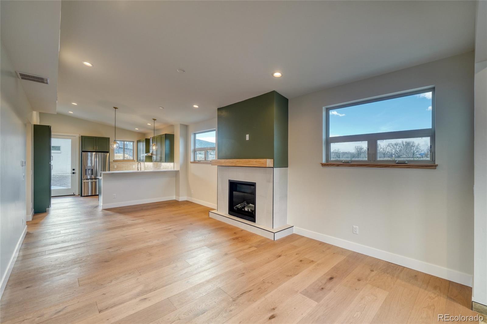 211 Southside Loop Salida, CO 81201 - Photo 11 of 39 a view of a livingroom with a fireplace