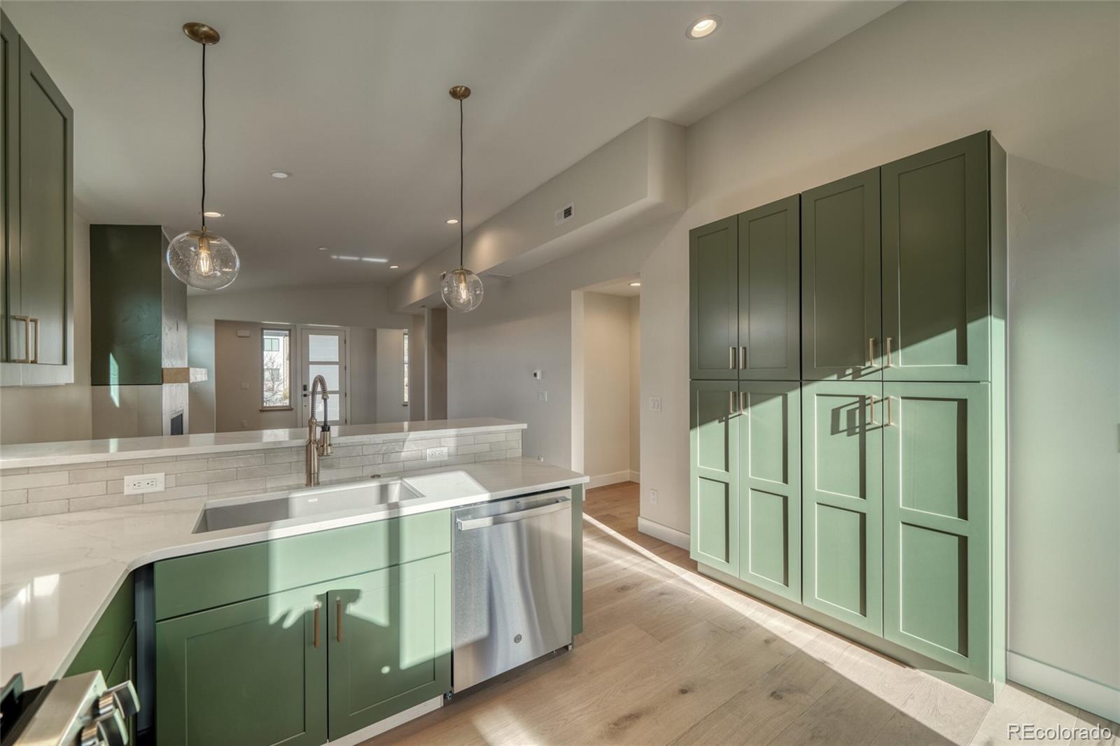 211 Southside Loop Salida, CO 81201 - Photo 17 of 39 a bathroom with a sink a large mirror and a shower