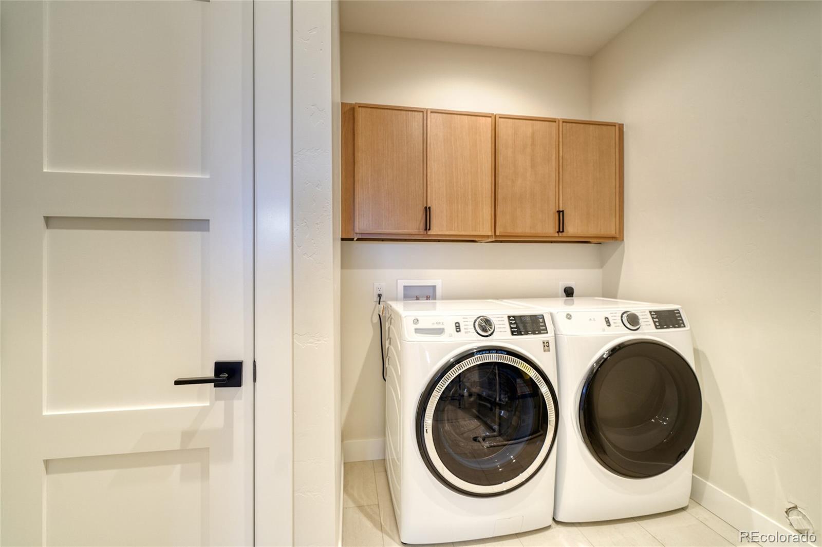 211 Southside Loop Salida, CO 81201 - Photo 26 of 39 a utility room with dryer and washer