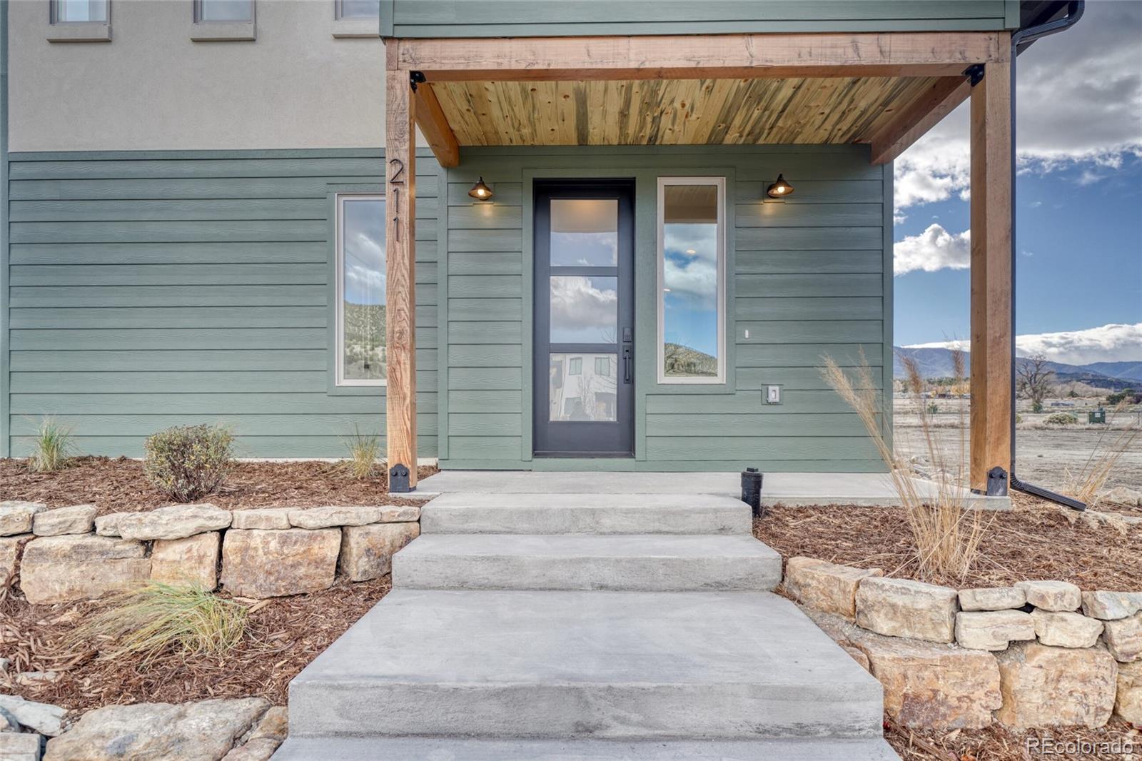 211 Southside Loop Salida, CO 81201 - Photo 8 of 39 a front view of a house with outdoor seating