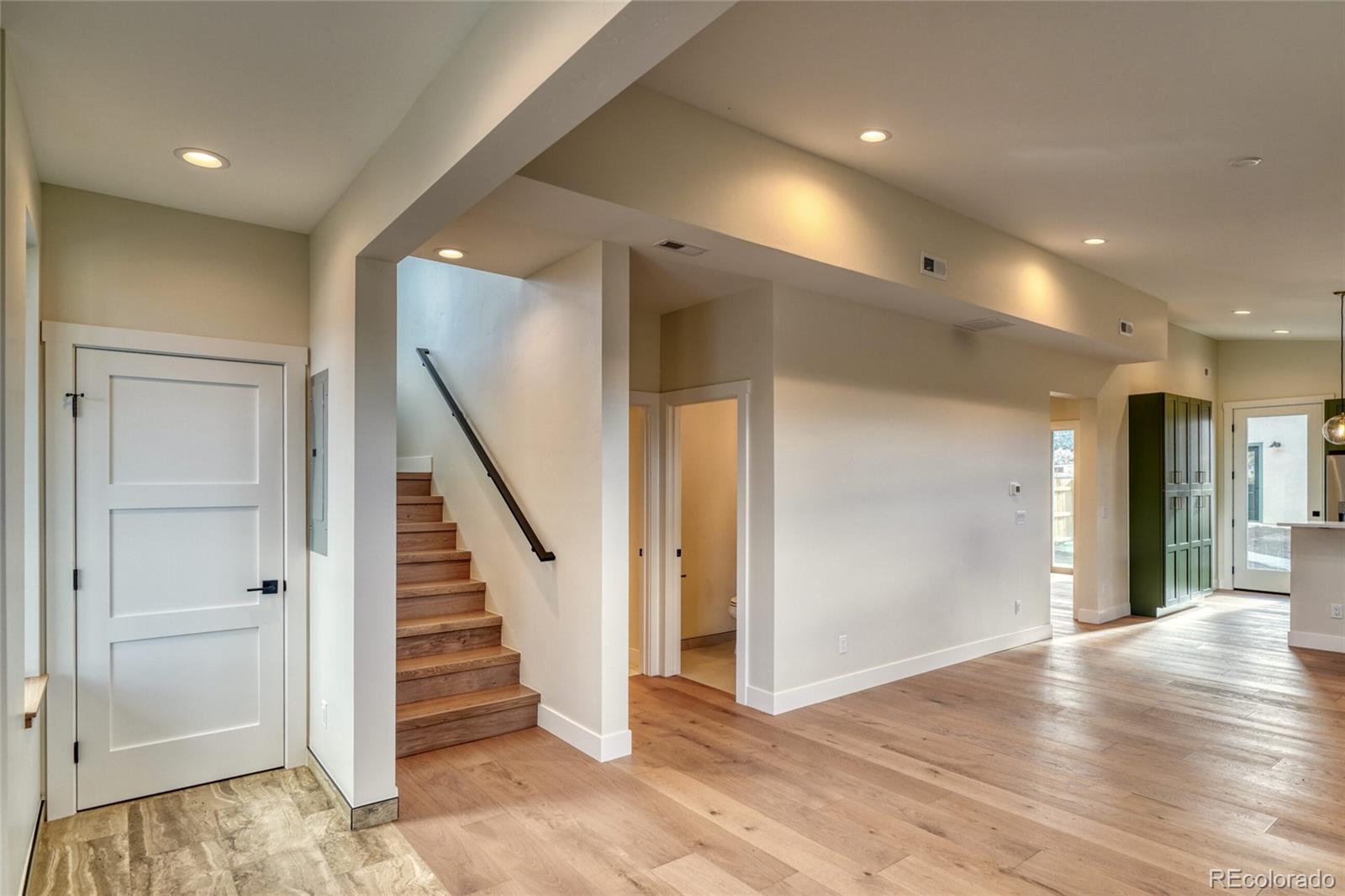 211 Southside Loop Salida, CO 81201 - Photo 10 of 39 a view of a hallway with wooden floor and entryway