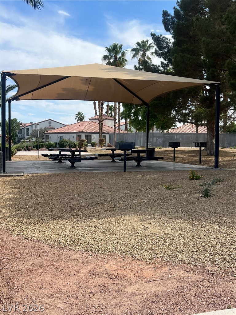 3318 North Decatur Boulevard, Unit 1174 Las Vegas, NV 89130 - Photo 21 of 23 This inviting outdoor space offers a shaded area for relaxation and recreation.