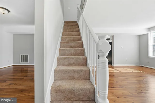 a view of entryway with wooden floor