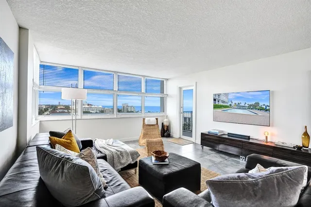 a bedroom with a bed and a view of bedroom