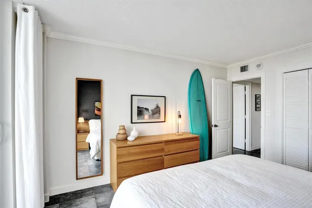 a view of a balcony with a floor to ceiling window