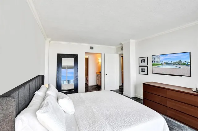 a view of a balcony with chairs