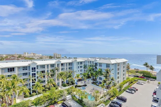 a view of a building with a street