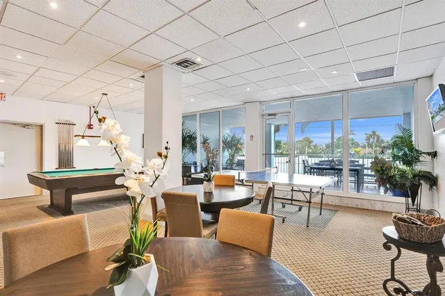 a view of a swimming pool with a terrace