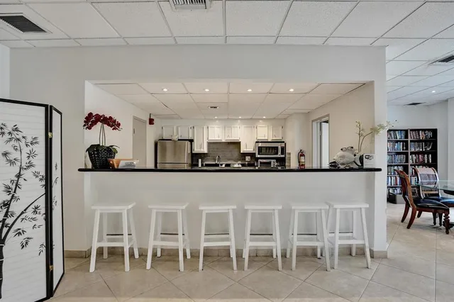 a view of a park with a palm tree