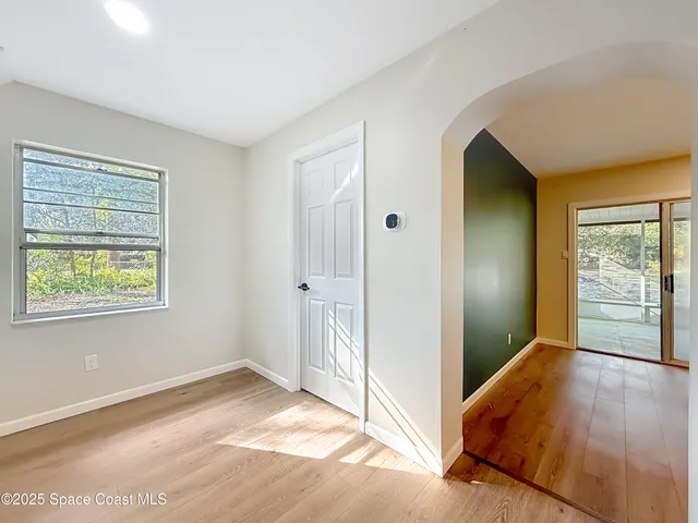 a kitchen with granite countertop a sink and a window