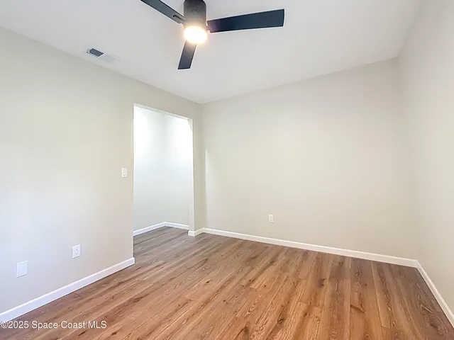 a view of empty room with front door