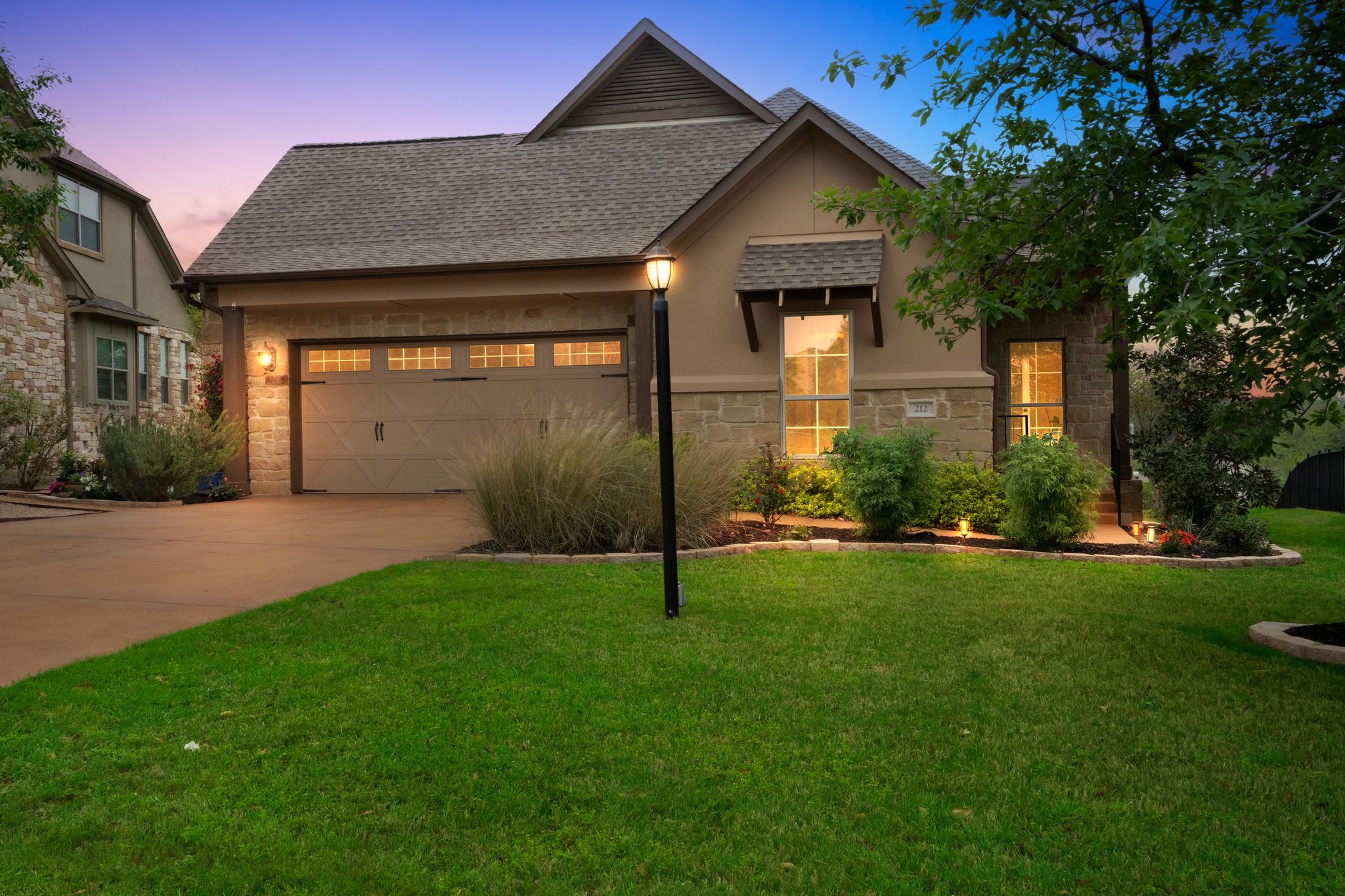 a house view with a garden space