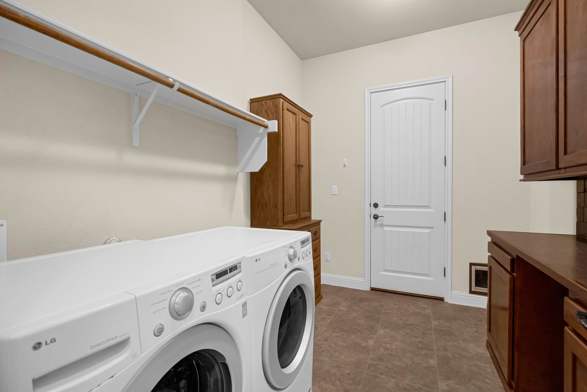 212 Tavish Trail Austin, TX 78738 - Photo 27 of 32 a utility room with dryer and washer