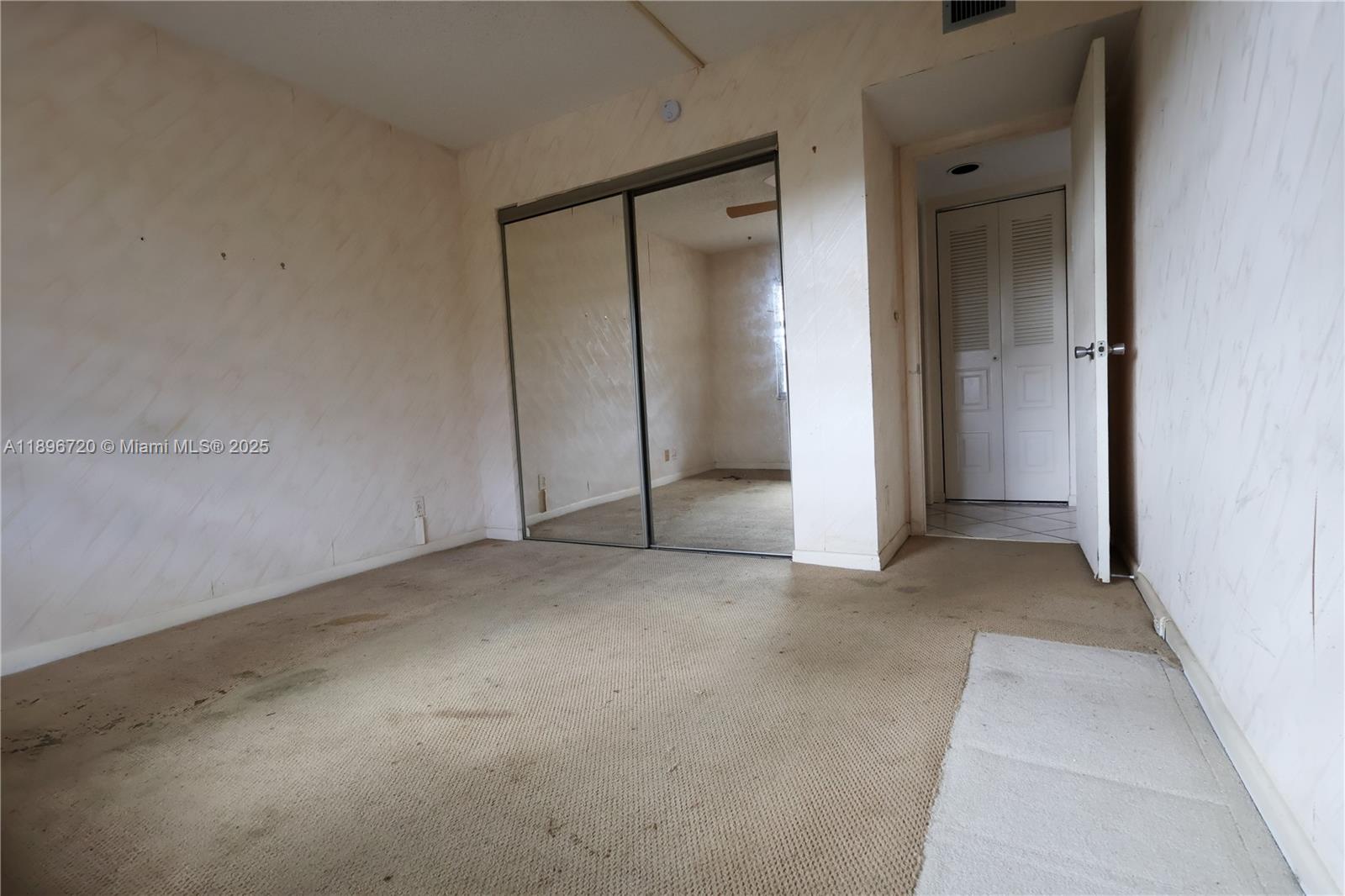 1705 Andros Isle, Unit E3 Coconut Creek, FL 33066 - Photo 16 of 17 a view of empty room