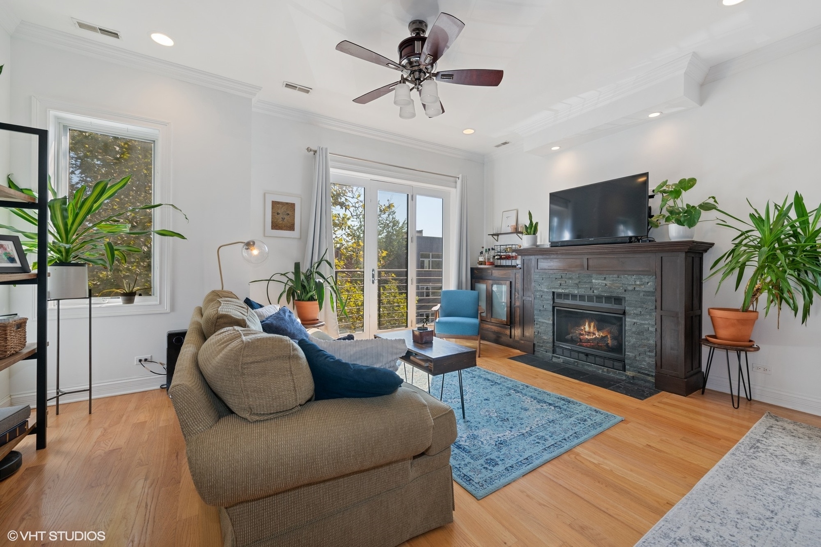 2642 West Cortez Street, Unit 3 Chicago, IL 60622 - Photo 2 of 19 a living room with furniture and a fireplace