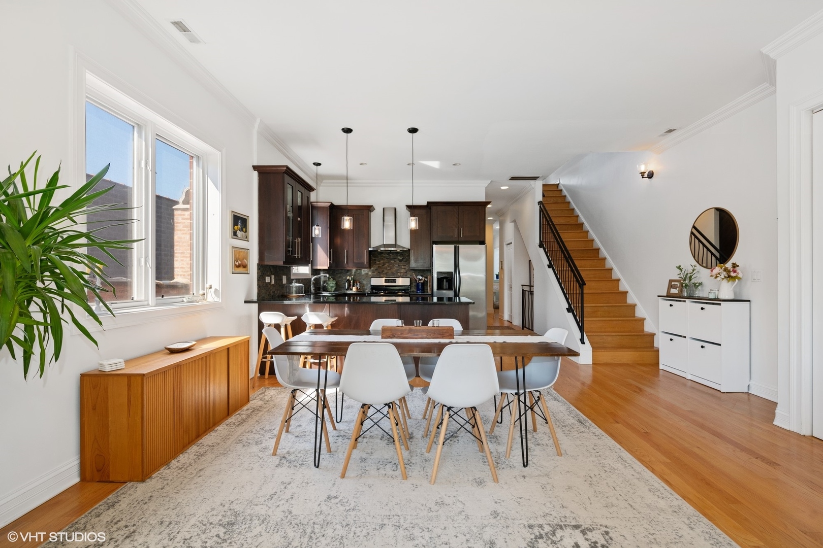 2642 West Cortez Street, Unit 3 Chicago, IL 60622 - Photo 7 of 19 a view of a dining room with furniture and wooden floor