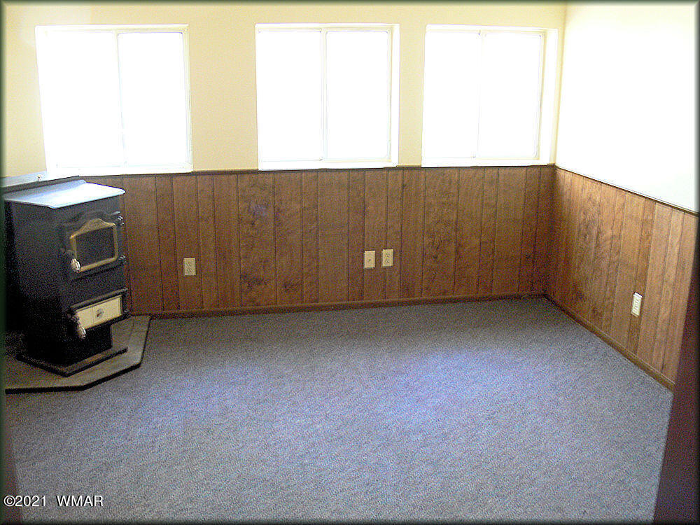 2179 Chevelon Road Overgaard, AZ 85933 - Photo 6 of 11 a view of an empty room and a window