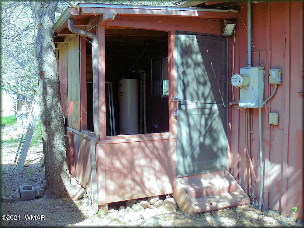 2179 Chevelon Road Overgaard, AZ 85933 - Photo 10 of 11 a view of a wooden door