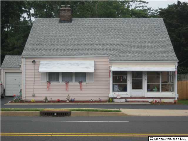 530 Newman Springs Road Lincroft, NJ 07738 - Photo 1 of 21 a view of a house with a terrace