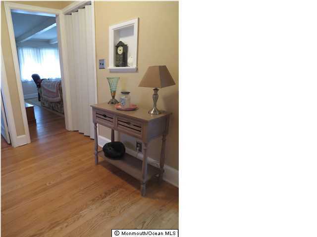 530 Newman Springs Road Lincroft, NJ 07738 - Photo 11 of 21 a living room with furniture and a table