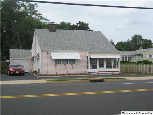 530 Newman Springs Road Lincroft, NJ 07738 - Photo 2 of 21 a aerial view of a house with a garden