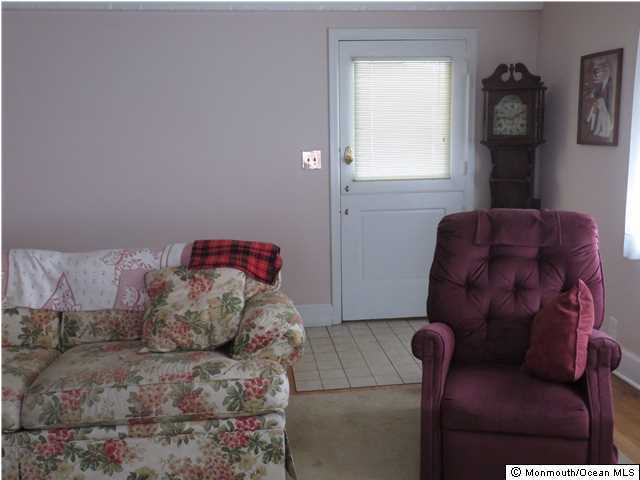 530 Newman Springs Road Lincroft, NJ 07738 - Photo 9 of 21 a bed room with a bed and a couch