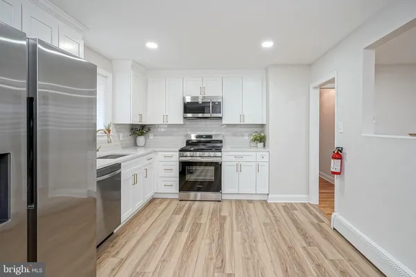 a bathroom with a sink and a shower