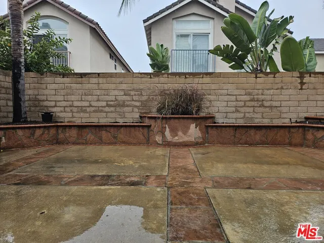 a front view of a house with glass windows