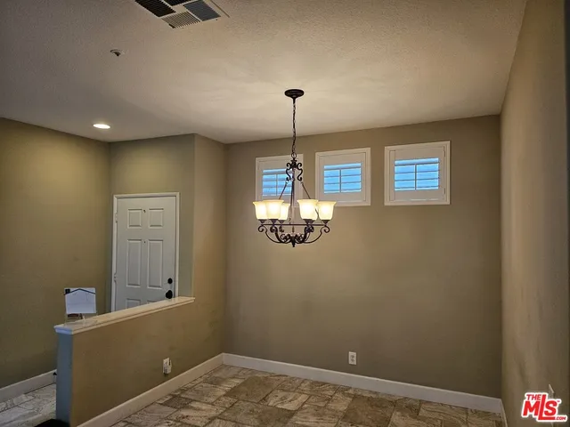a view of a livingroom with a window