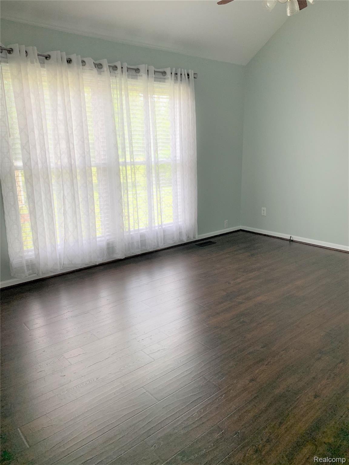 57260 12 Mile Road New Hudson, MI 48165 - Photo 13 of 22 master bed.jpg