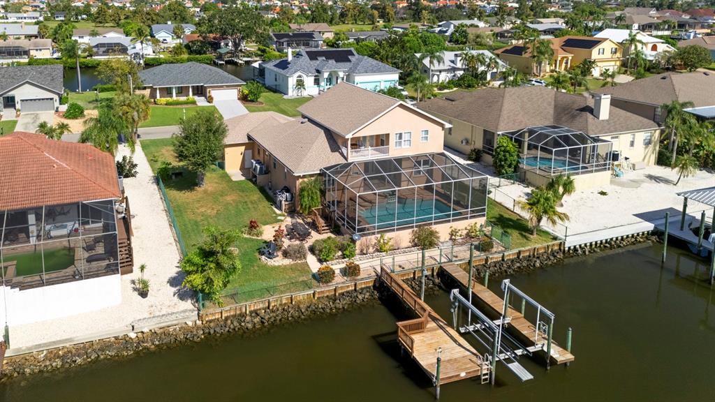 830 Golf Island Drive Apollo Beach, FL 33572 - Photo 13 of 87 an aerial view of a house with a lake view
