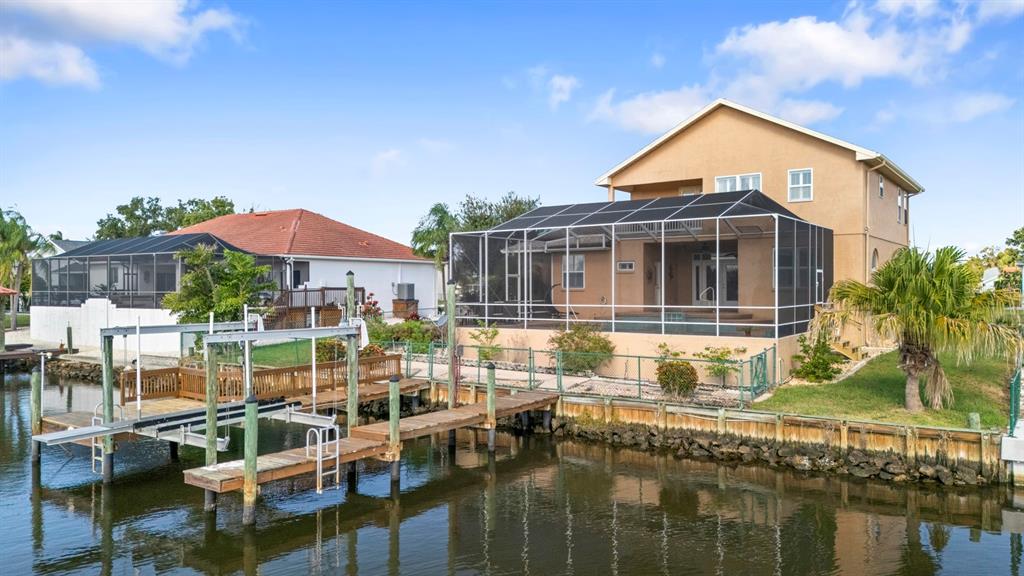 830 Golf Island Drive Apollo Beach, FL 33572 - Photo 16 of 87 a front view of a house with swimming pool