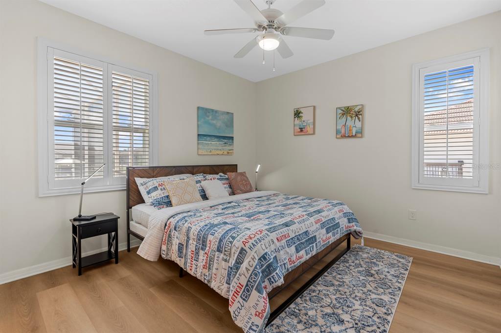 830 Golf Island Drive Apollo Beach, FL 33572 - Photo 39 of 87 a bedroom with a bed and a window