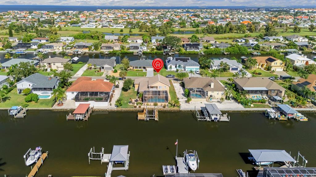 830 Golf Island Drive Apollo Beach, FL 33572 - Photo 4 of 87 an aerial view of residential houses with outdoor space