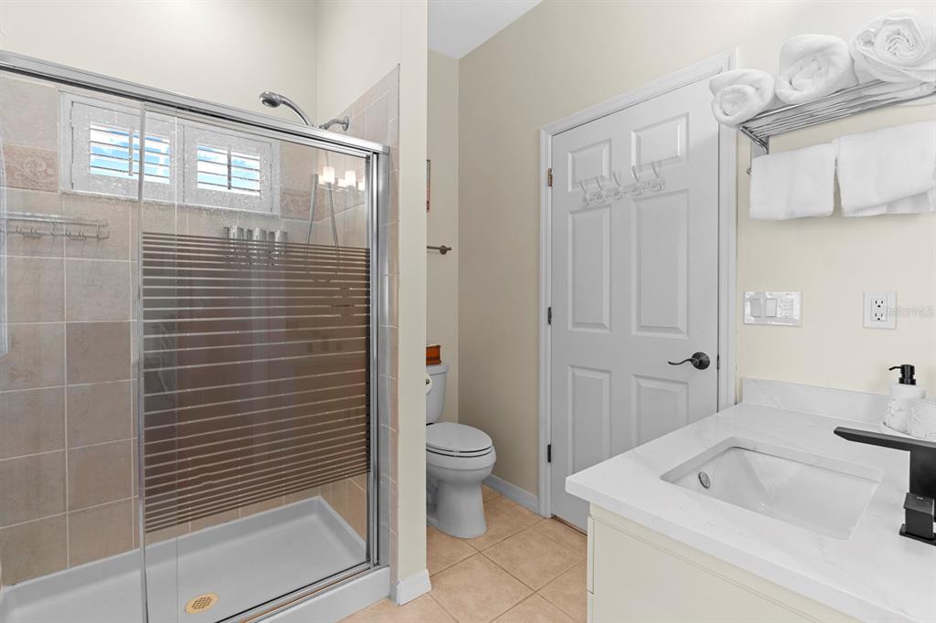 830 Golf Island Drive Apollo Beach, FL 33572 - Photo 42 of 87 a bathroom with a sink a toilet and shower