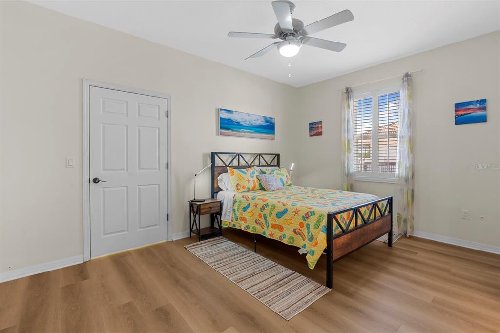 830 Golf Island Drive Apollo Beach, FL 33572 - Photo 43 of 87 a bed sitting in a bedroom next to a window