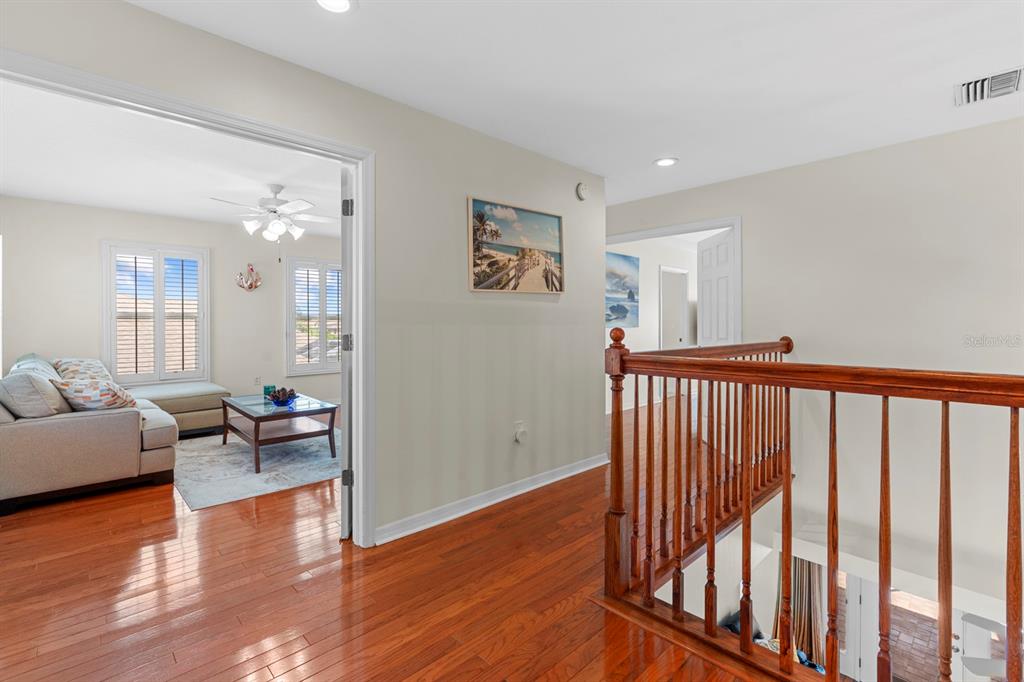 830 Golf Island Drive Apollo Beach, FL 33572 - Photo 52 of 87 a view of a livingroom with furniture and hardwood floor