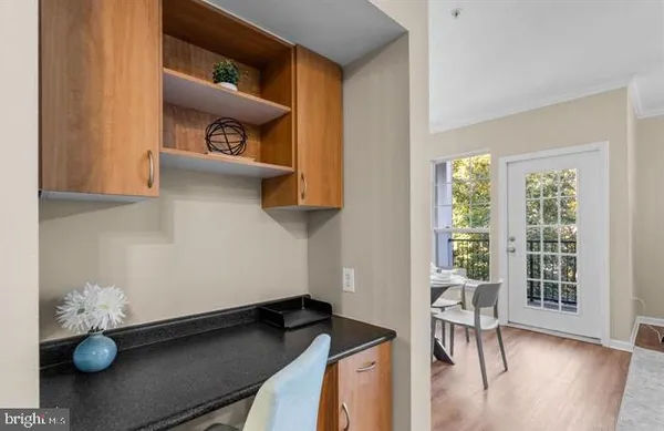 a bed room with a bed and a window