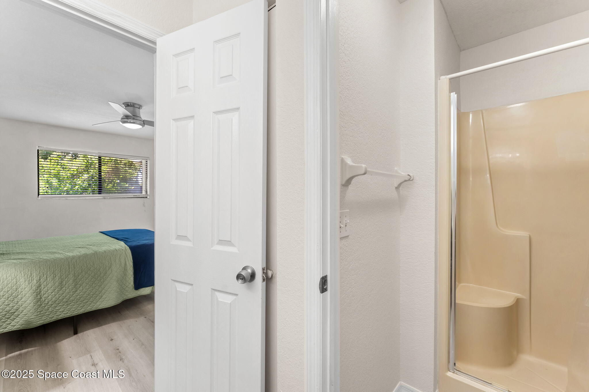 129 Seawind Drive, Unit 25 Satellite Beach, FL 32937 - Photo 11 of 28 a en suite bathroom with a shower