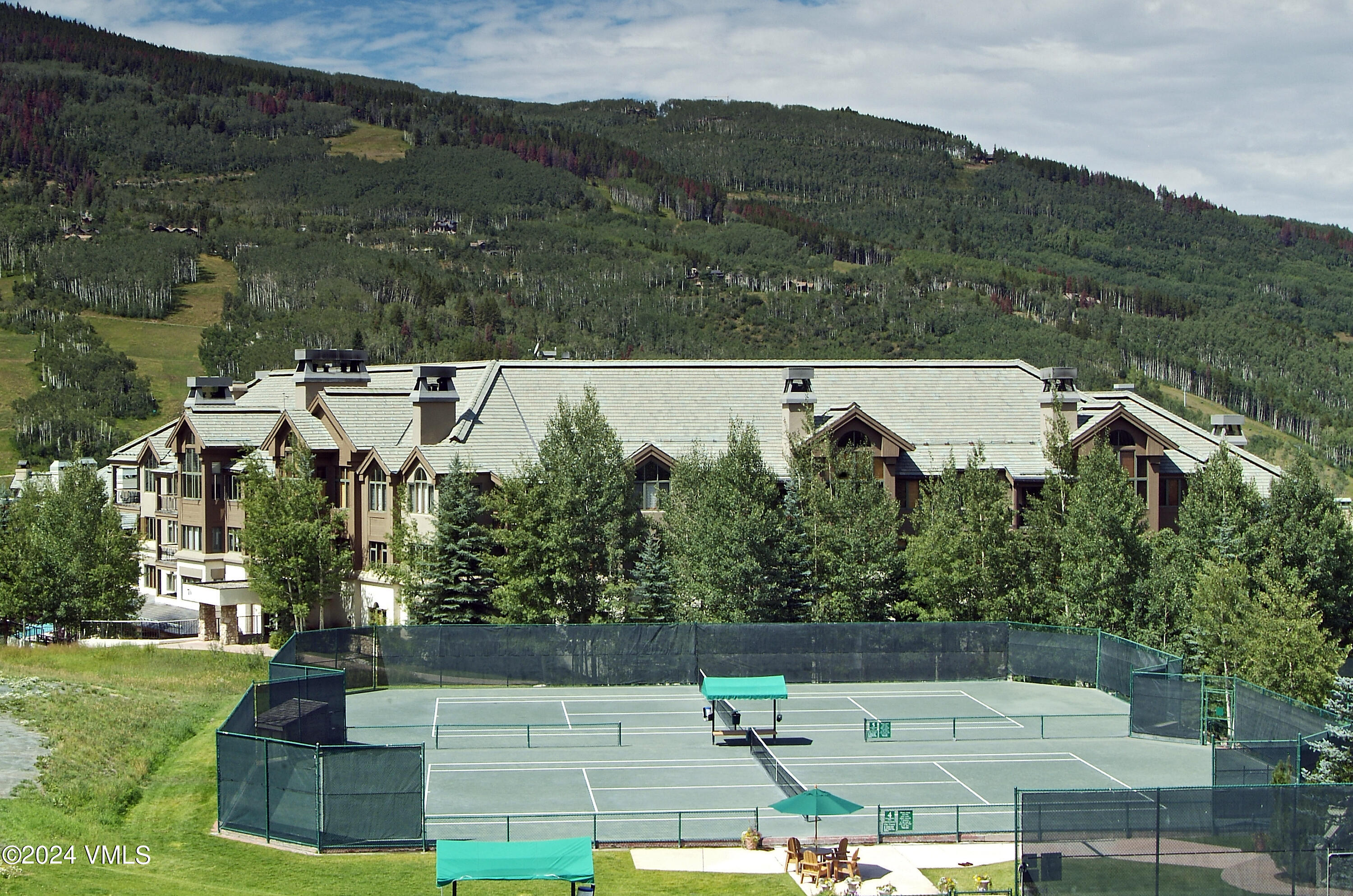 15 Highlands Lane, Unit R407 Beaver Creek, CO 81620 - Photo 15 of 18 an aerial view of a house with a yard